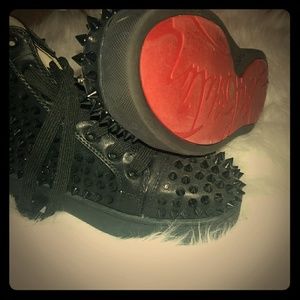 Spiked red bottom sneakers